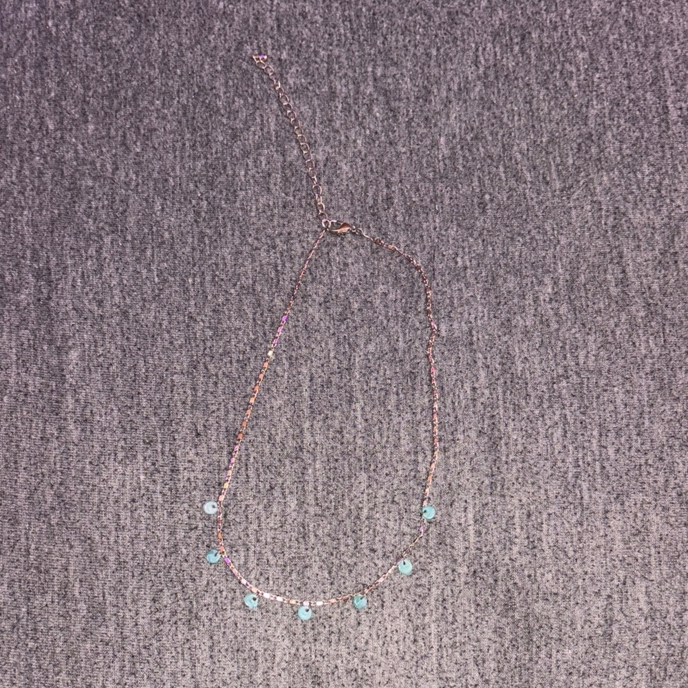 Chic Gold Necklace with Turquoise Highlights